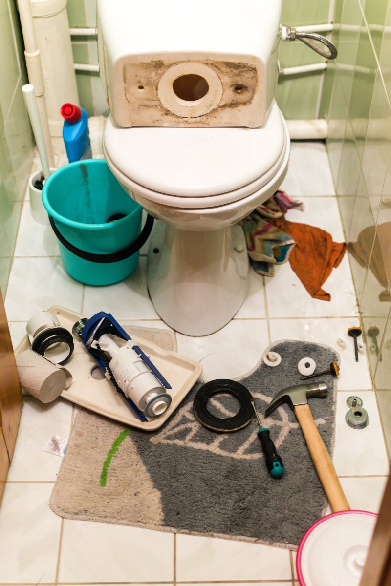 New toilet being installed in a Belgravia bathroom